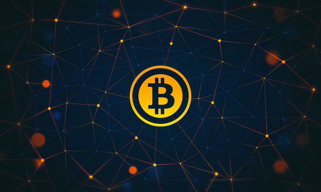 Bitcoin logo over a network graphic, representing a dollar token issued against Bitcoin collateral